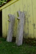 A pair of marble columns with Regency scroll decoration. (From a fire surround)