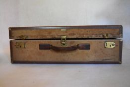 A vintage Hartmann Skymate leather bound suitcase. H.24 W.74 D.51cm