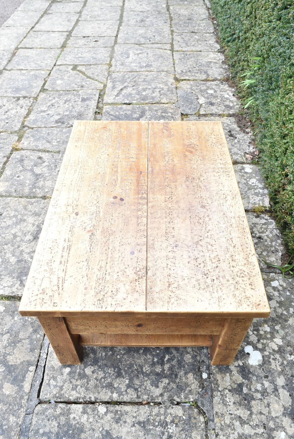 A contemporary pitch pine low table fitted with frieze drawers on block supports united by - Image 6 of 7