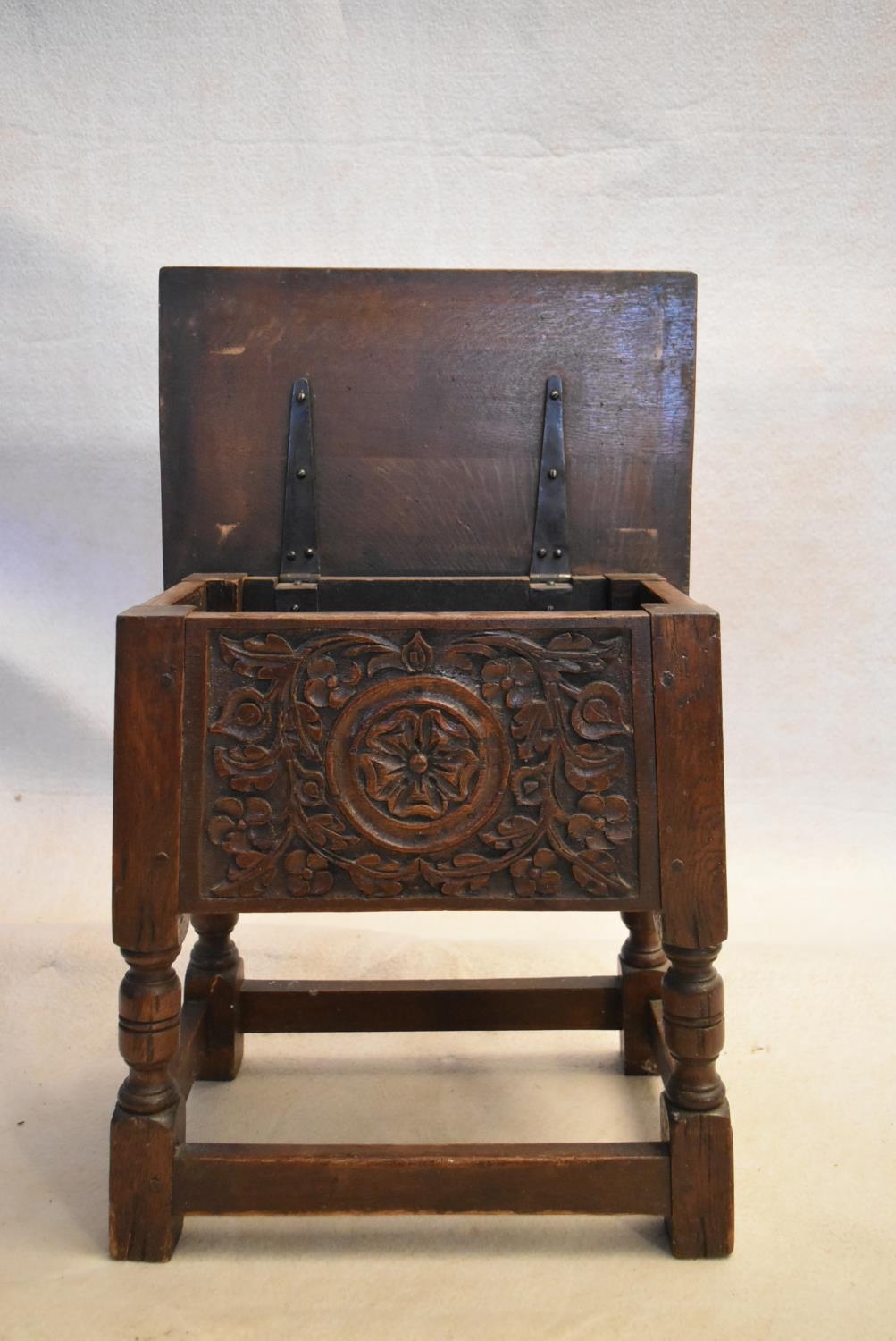 An 18th century country oak bible box stool with carved panel on turned tapering supports. H.47 W.44 - Image 5 of 7