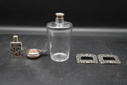 A silver topped dressing table bottle, a Continental silver scent bottle and wine taster along