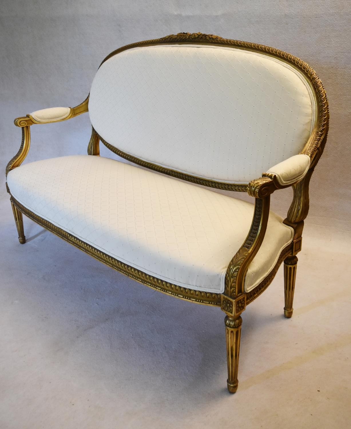 A 19th century French carved giltwood canape with ribbon and floral carved back rail reupholstered - Image 4 of 7