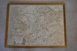 A gilt framed and glazed map of the Champagne region. H.54 W.70cm