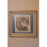 A framed and glazed charcoal study, female portrait, indistinctly signed and inscribed, dated