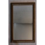 A 19th century bevelled plate wall mirror in giltwood and gesso frame. H.96 W.62cm