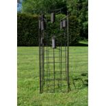 A set of four Chinese style metal framed lawn wind chimes. H.102 W.40cm (Some bells missing as