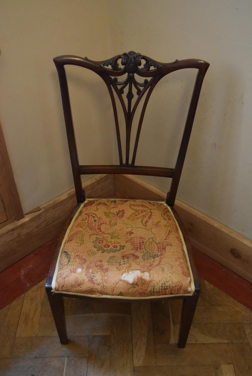 A late Victorian mahogany salon chair with floral carved splat back on square tapering supports. H. - Image 2 of 5