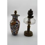 A Chinese style Gien table lamp in the form of a baluster vase along with a 19th century brass oil