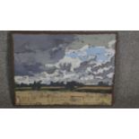 An oil on canvas, Michael Woods, landscape with stormy sky, signed and dated. H.46 W.61cm