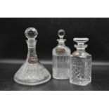 Three crystal cut glass decanters, Port, Gin and Scotch. H.30 Dia.20cm (port) (3)
