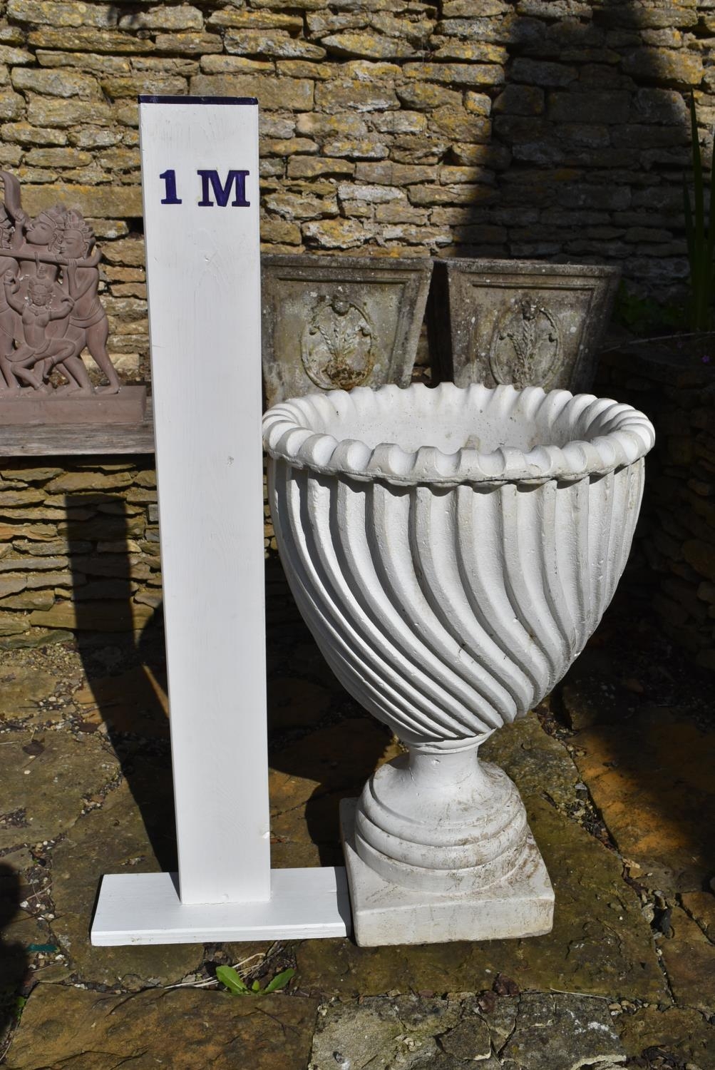 A painted reconstituted stone garden urn with spiral decoration on stepped base. H.68 Dia.46cm - Image 3 of 4