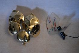 A gilt metal leaf form wall light fitting along with a vintage painted and frosted glass example.