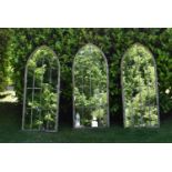 A set of three Gothic arched garden mirrors in distressed painted window pane metal frames. H.159