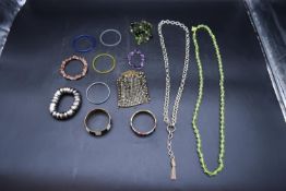 A collection of jewellery. Including bangles, a amethyst and gilded wire articulated bracelet and