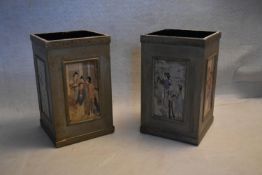 A pair of painted wastepaper baskets with printed Chinese panels.
