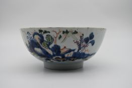 A 19th century Chinese Imari hand painted porcelain bowl. Decorated with a mountain landscape