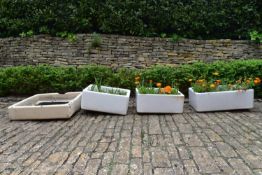 Four vintage Belfast style sinks used as garden planters. H.29 W.76 D.46cm