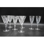 A set of five Waterford crystal 'Sheila' white wine glasses along with a similar pair of sherry