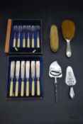 A collection of silver and silverplate. To include two silver brushes with embossed foliate