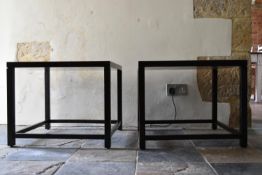 A pair of contemporary teak lamp tables. H.46 W.56 D.56cm