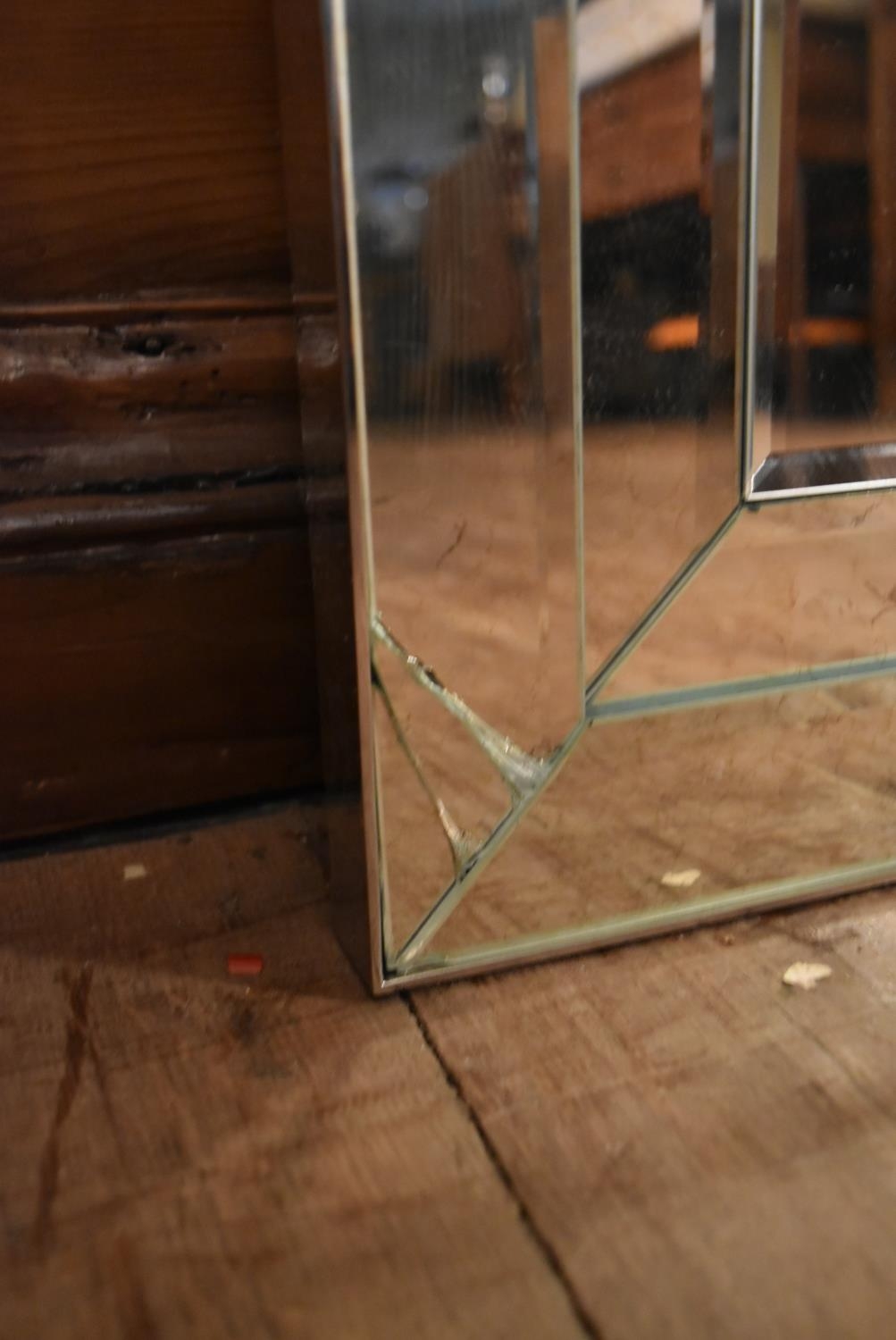 A large wall mirror in bevelled and glazed frame. H.142 W.170cm (some damage as photographed) - Image 4 of 6