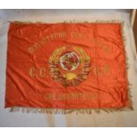 A Soviet era Russian silk political banner with hand sewn and embroidered hammer and sickle