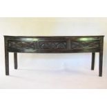 A 17th century oak dresser base with carved drawers and supports. H.76 W.190 D.46cm
