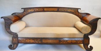 An early 19th century Dutch mahogany and floral marquetry inlaid sofa, the shaped back and