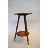 A late 19th century rosewood occasional table with scrolling ribbon, foliate and musical