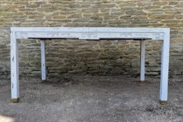 A Chinese hardwood distressed painted dining table with two extra leaves. H.70 W.160 D.108cm (ext.