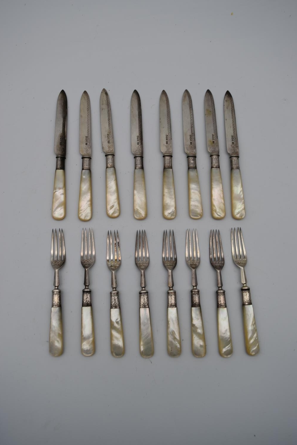 A set of eight late Victorian fruit knives and forks with Mother of Pearl handles, Sheffield 1897.