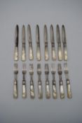 A set of eight late Victorian fruit knives and forks with Mother of Pearl handles, Sheffield 1897.