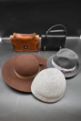 Two vintage handbags along with a miscellaneous collection of three hats, designer labels. H.16 W.