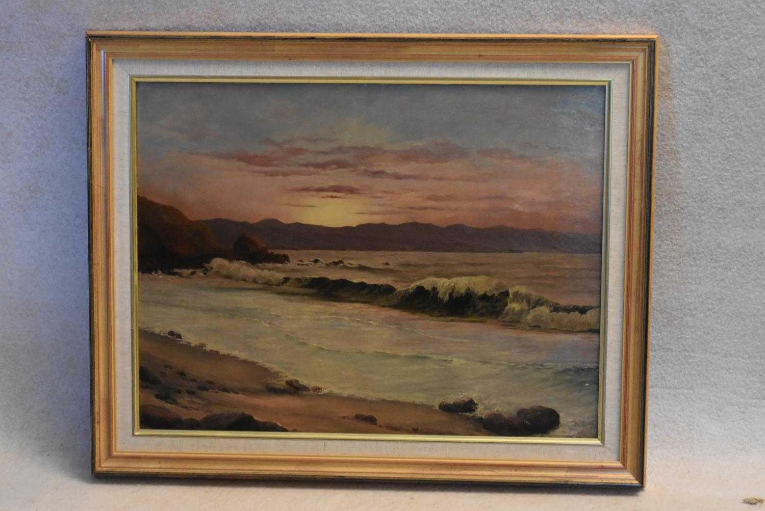 A framed oil on board; Surf on the Chilean Coast, signed R Angus Clay with label verso. H.51 W.63cm