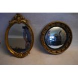 A Regency style gilt framed convex wall mirror and a mid century gilt framed mirror with floral