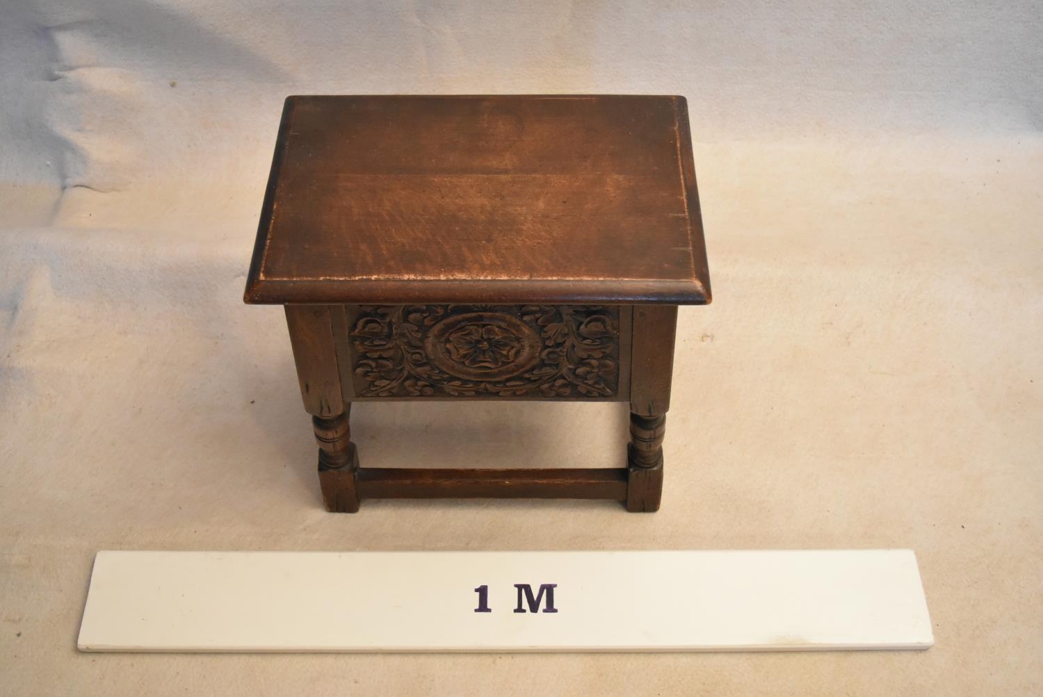 An 18th century country oak bible box stool with carved panel on turned tapering supports. H.47 W.44 - Image 7 of 7