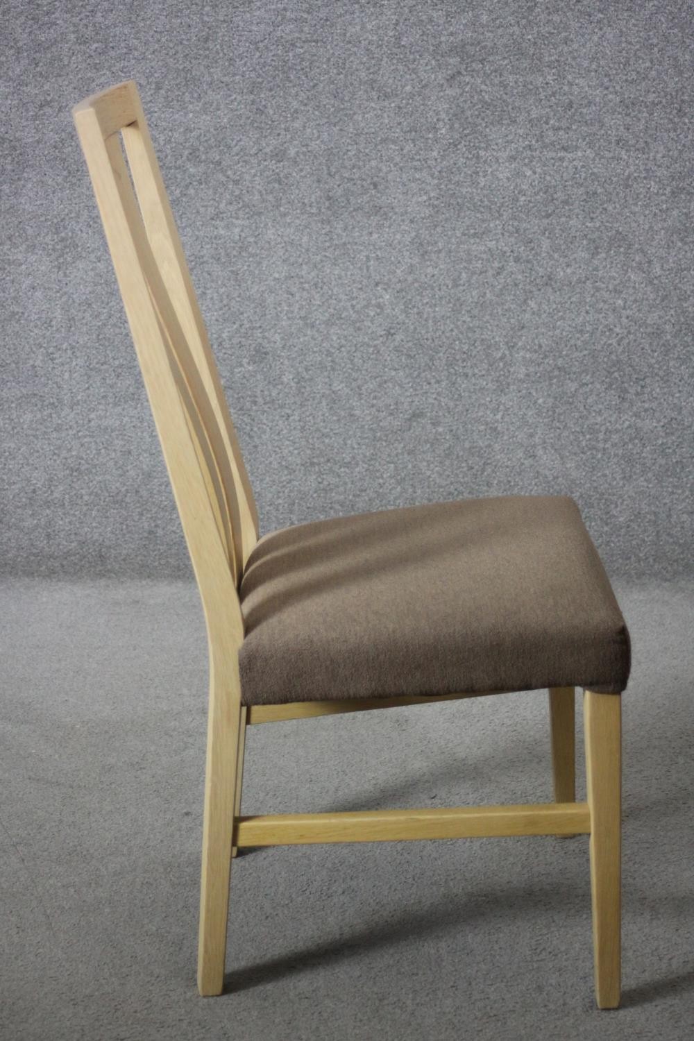 A set of six contemporary slat back light oak dining chairs with upholstered seats on square - Image 4 of 6
