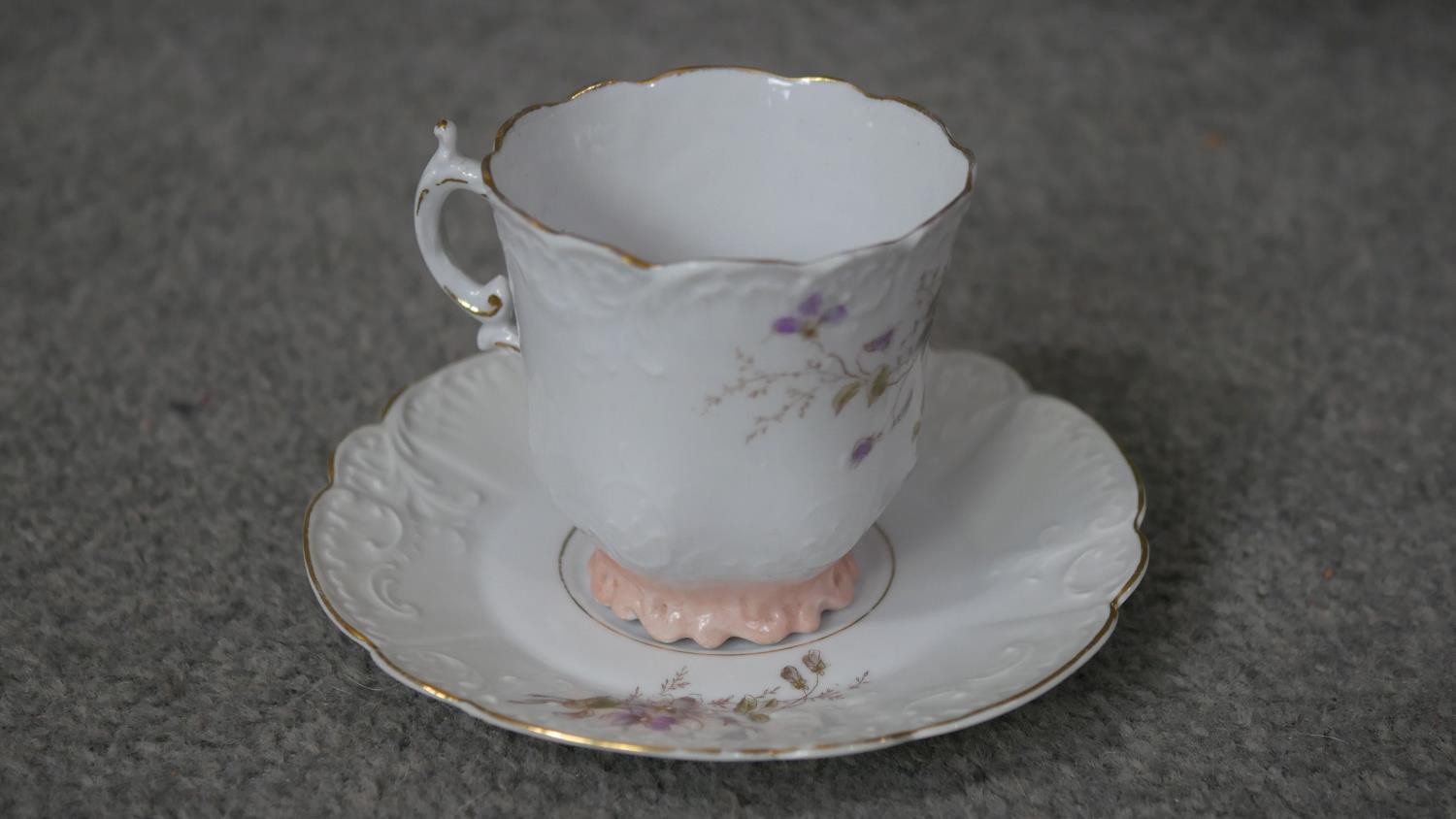 A Victorian hand painted fine china ten person part coffee set. Decorated with violets and gilded - Image 5 of 14