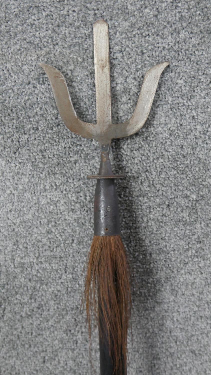 A Polynesian hardwood and metal ceremonial staff with trident and animal hair detail. Carved - Image 3 of 5
