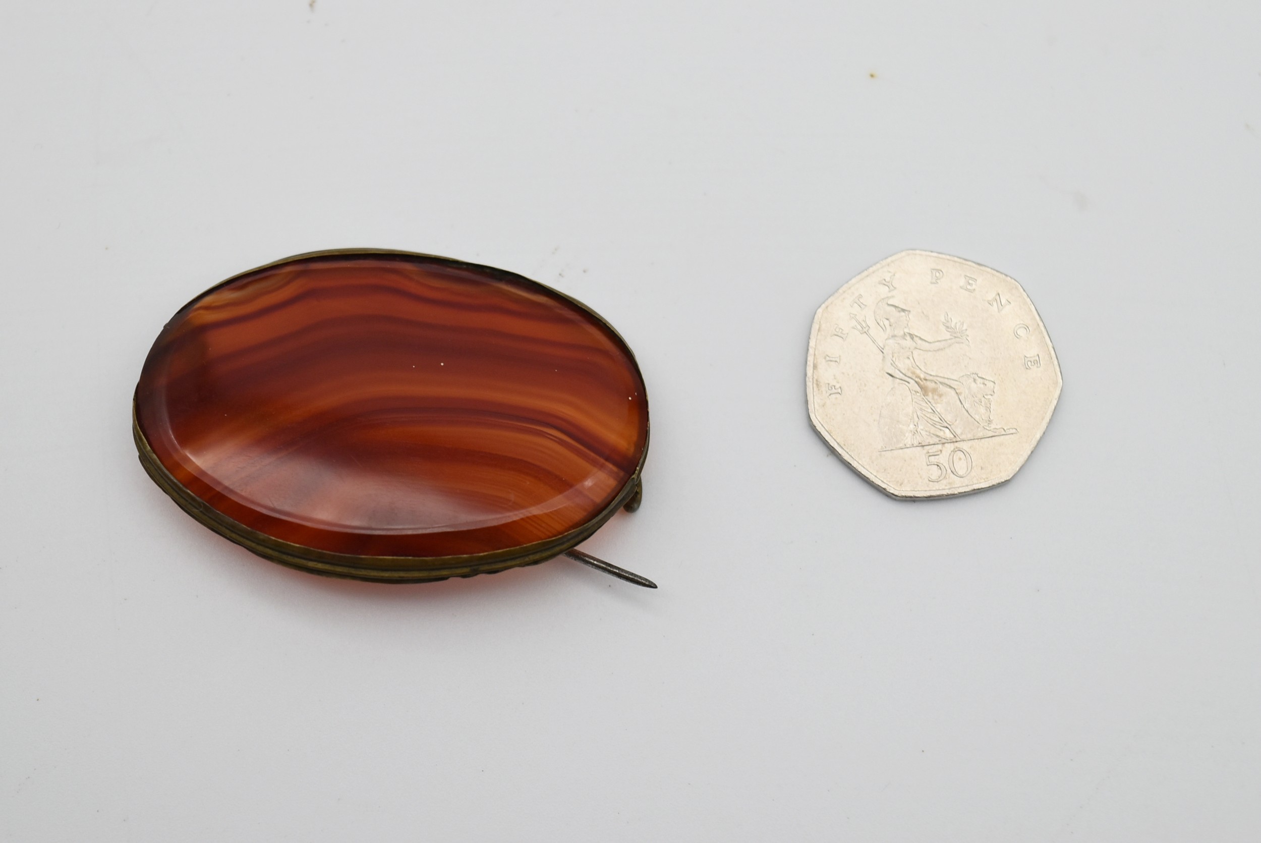 An antique Carnelian oval brooch with a secure pin to the reverse. L.7cm - Image 4 of 4