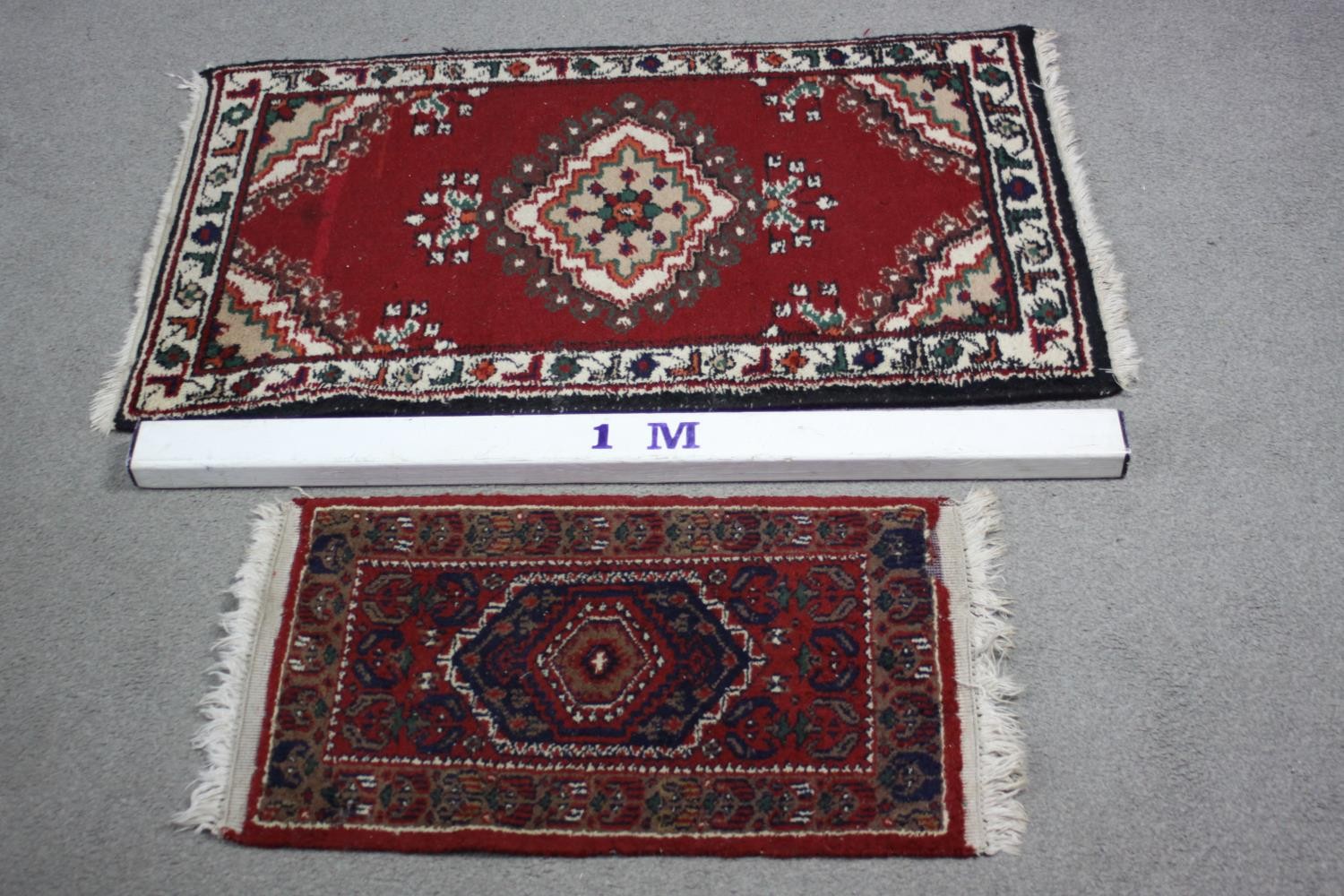 Two small Eastern rugs each on a red ground. L.110 W.60cm. (largest) - Image 2 of 8