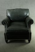 Library armchair, 19th century style in leather upholstery.
