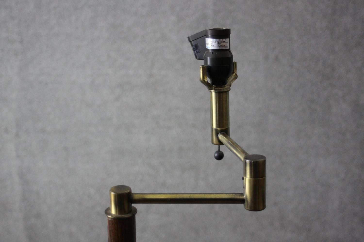 A vintage teak and brass standard lamp with hinged arm. H.134 Dia.30cm. - Image 2 of 4