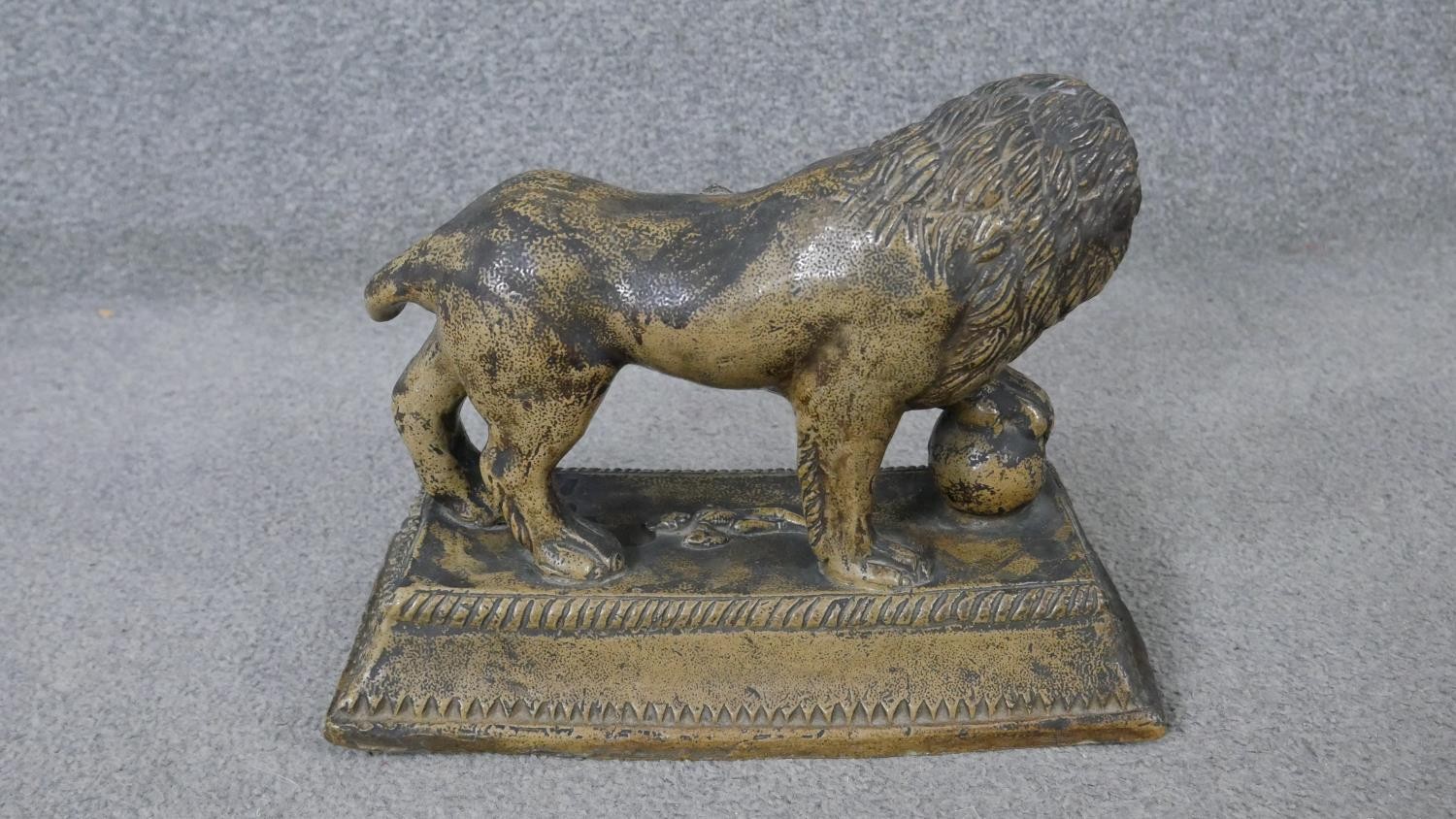 An early 19th century Staffordshire pearlware ceramic lion with ball, sitting on a rectangular - Image 7 of 8