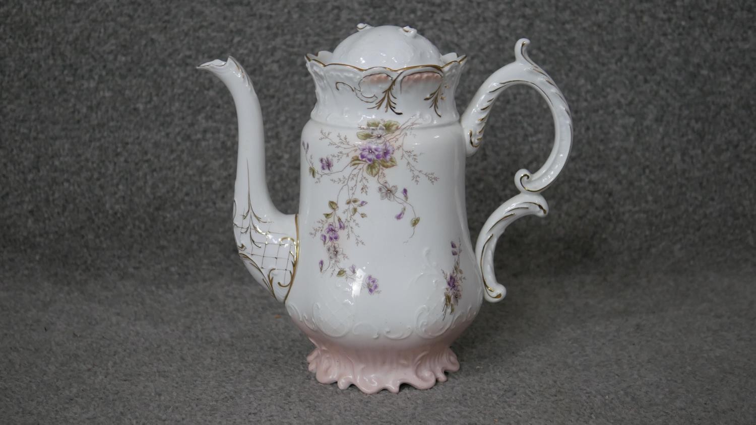 A Victorian hand painted fine china ten person part coffee set. Decorated with violets and gilded - Image 13 of 14