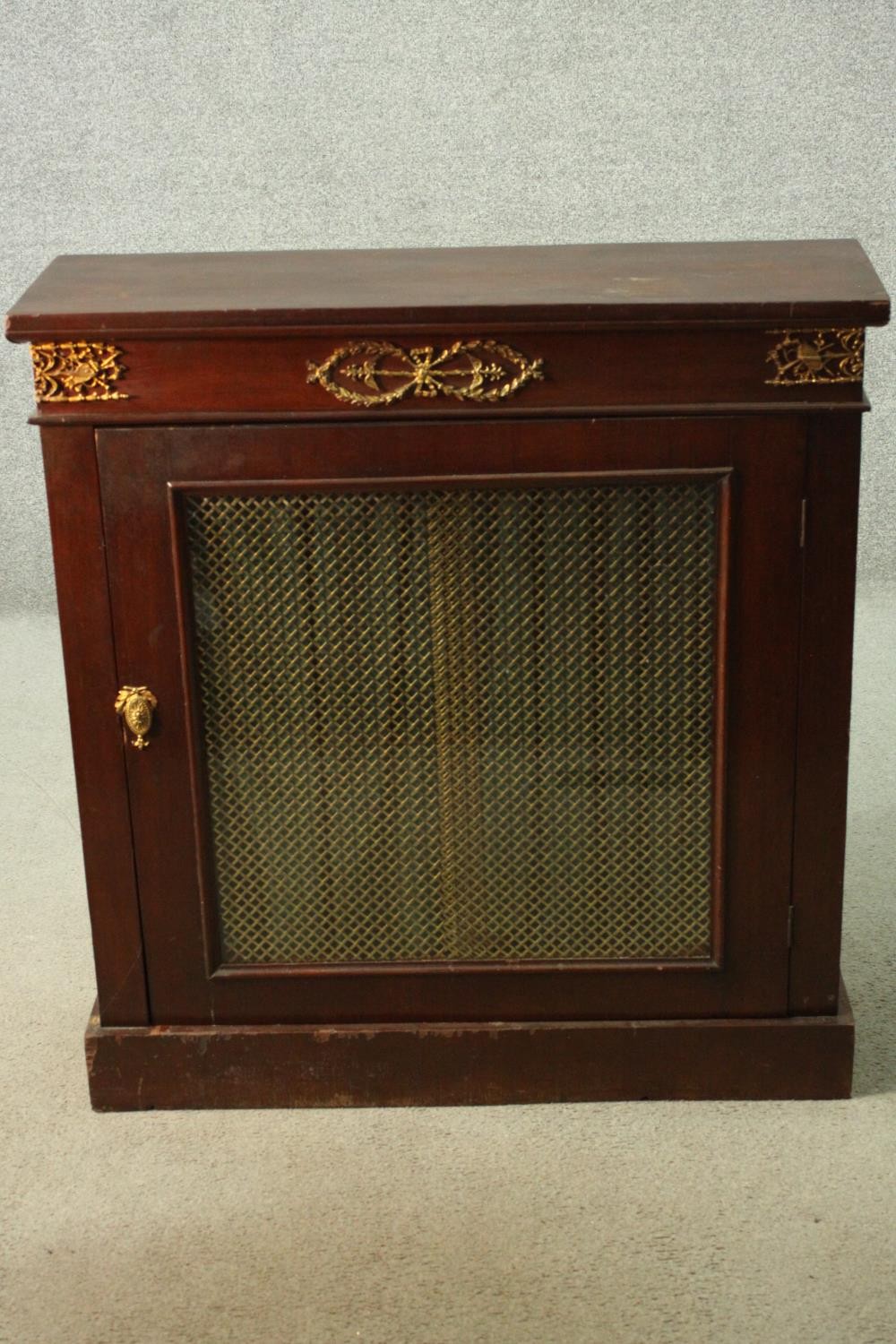 Pier cabinet, Empire style mahogany with ormolu mounts. H.94 W.89cm.