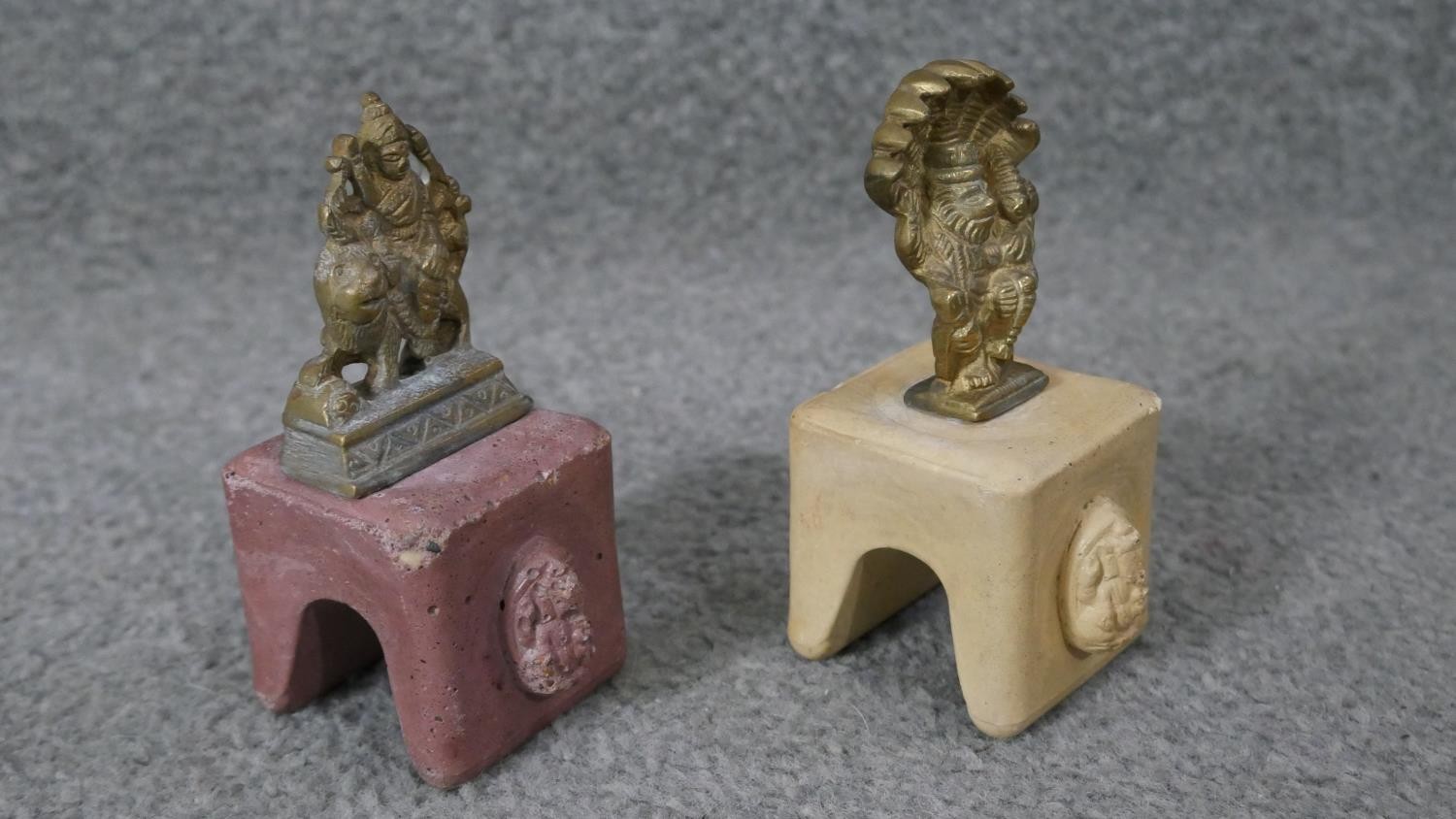 A carved Chinese soapstone chop in the form of an immortal along with two Indian brass deities on - Image 9 of 10