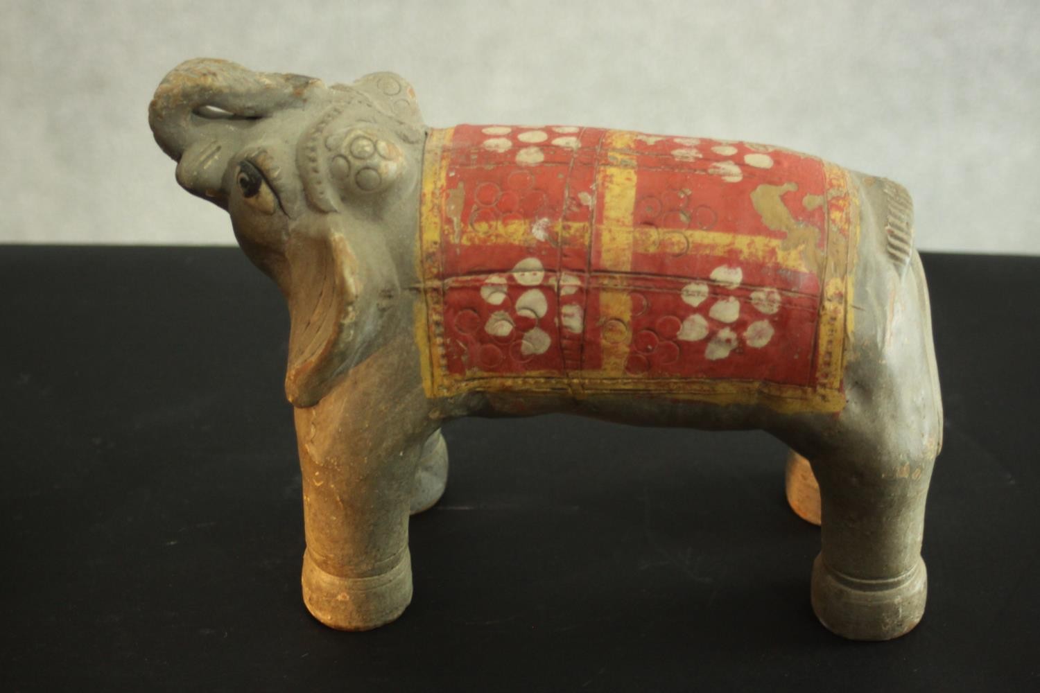 A terracotta figure of a couple, along with a ceramic elephant and a ceramic horse. H.30 W.30 D.6 - Image 8 of 11