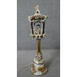 A large vintage Capodimonte style ceramic hand painted gilded lantern form table lamp with floral