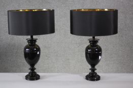 A pair of contemporary glazed table lamps. H.62cm.
